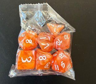 Набір кубиків (7 шт.) помаранчевий із білими цифрами (Opaque Orange with White Numbers Dice Set)